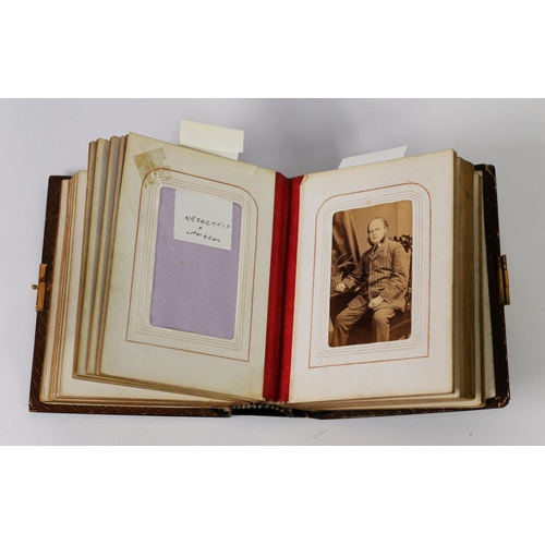 345 - SMALL VICTORIAN ALBUM WITH PAPIER-MACHE COVERS and gilt brass clasp CONTAINING SIXTEEN CARTE-DE-VISI... 