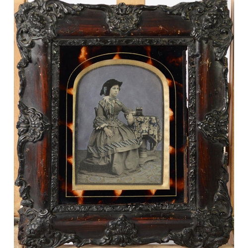 348 - TWO VICTORIAN SLIGHLY TINTED PORTRAIT DAGUERREOTYPES in original glazed frames, ONE with revealed la... 