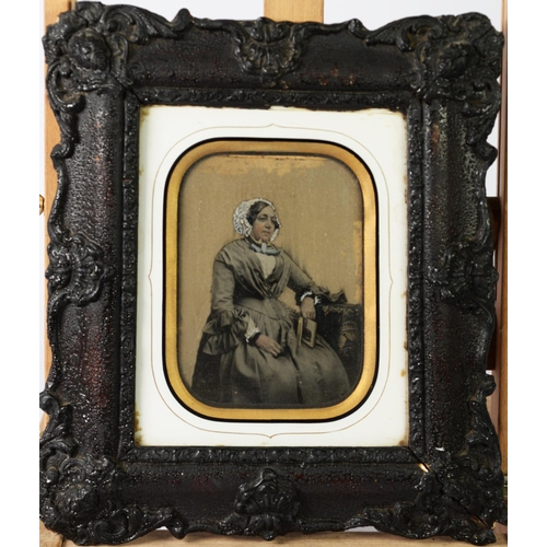 348 - TWO VICTORIAN SLIGHLY TINTED PORTRAIT DAGUERREOTYPES in original glazed frames, ONE with revealed la... 