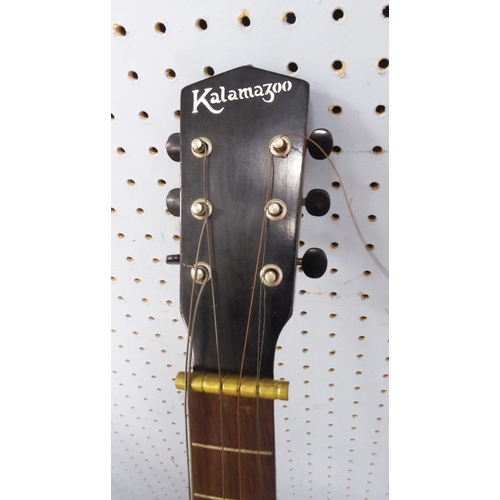 250 - A guitar with the name Kalamazoo printed on the head stock, with inside label stating made in the US... 