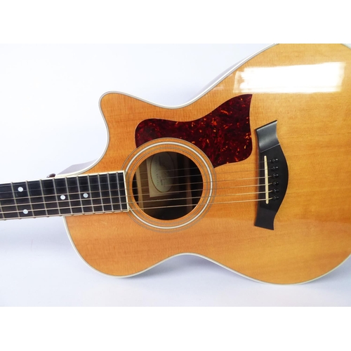 252 - Taylor, model 421-CE, grand concert electro acoustic guitar, short neck, cutaway. Fitted with a Tayl... 