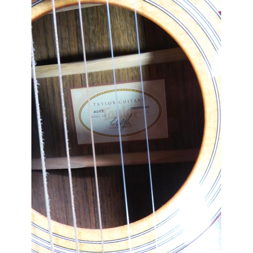 252 - Taylor, model 421-CE, grand concert electro acoustic guitar, short neck, cutaway. Fitted with a Tayl... 