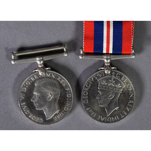 67 - TWO WORLD WAR II SERVICE MEDALS, 1939 - 45 Defence Medal and 1939 - 45 War Medal with ribbon (2)