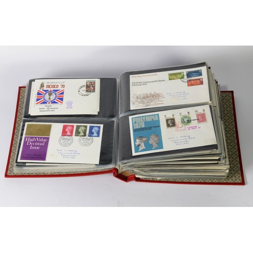 106 - BULGING RED BINDER HOUSING A SELECTION OF MODERN ALL-WORLD COVERS