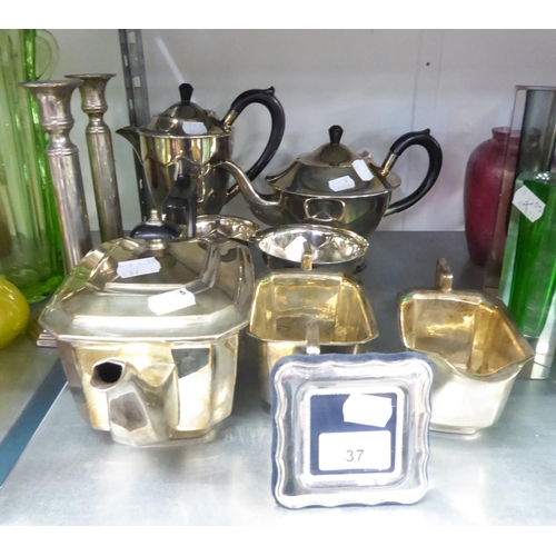 37 - ART DECO STYLE THREE PIECE SILVER PLATED TEA SET, PLUS SIMILAR PERIOD FOUR PIECE TEA SET, SILVER HAL... 