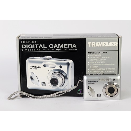 315 - TRAVELER DC6900 DIGITAL CAMERA, 6 MEGAPIXELS, 2.4” COLOUR SCREEN, BOXED AND A KONICA ‘REVIO’ Z2 COMP... 