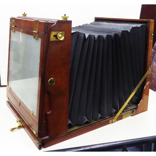 287 - W. WATSON & SONS MAHOGANY STEREO READY LARGE FORMAT TAILBOARD CAMERA, including a selection of m... 