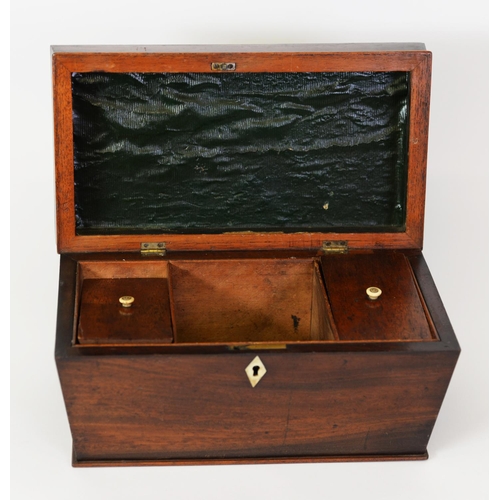 75 - EARLY NINETEENTH CENTURY MAHOGANY TEA CADDY, of sarcophagus form with twin lidded compartments to th... 