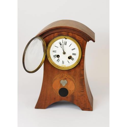 27A - ARTS AND CRAFTS INLAID MAHOGANY MANTLE CLOCK, the 4” enamelled Roman dial powered by a drum shaped m... 