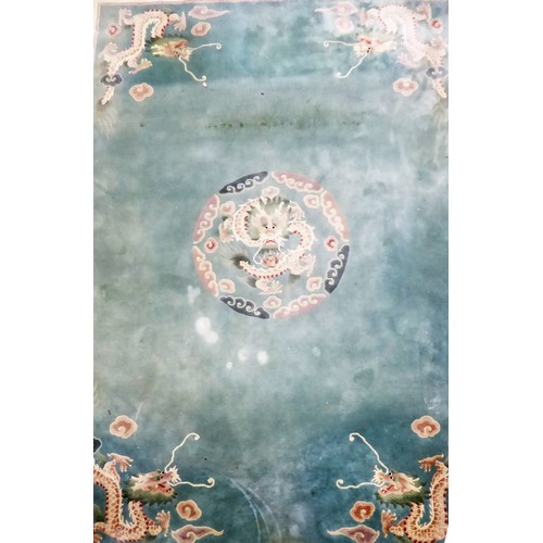 8 - HEAVY QUALITY EMBOSSED WASHED CHINESE CARPET, with plain pale green field, with centre circular drag... 