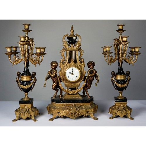 59 - LOUIS XV STYLE ‘IMPERIAL’ BRASS AND BLACK VEINED MARBLE THREE PIECE CLOCK GARNITURE, the CLOCK with ... 