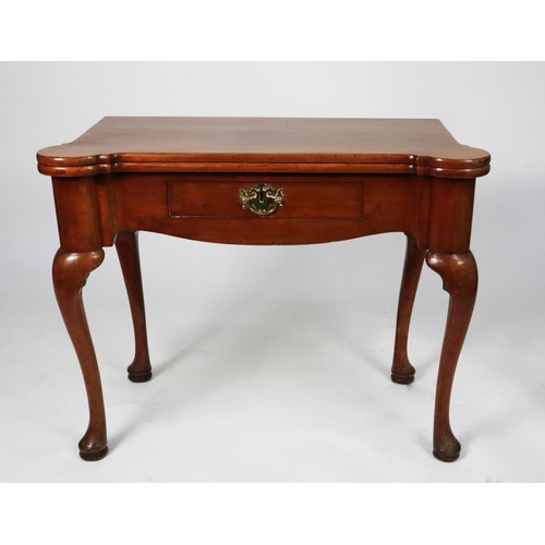 162 - GEORGE III FIGURED WALNUT CLUB CORNER FOLD OVER CARD TABLE, the shaped top enclosing a green baize l... 