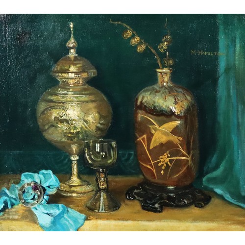 195 - M. HAMILTON (circa 1930s) OIL PAINTING Still life with glass vase and cover, oriental vase, a glass ... 