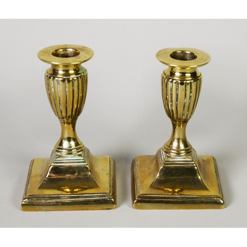 127B - THREE PAIRS OF BRASS EJECTOR CANDLESTICKS, 11 ¾”- 4 ¾” (29.9cm–12cm) high, (6)