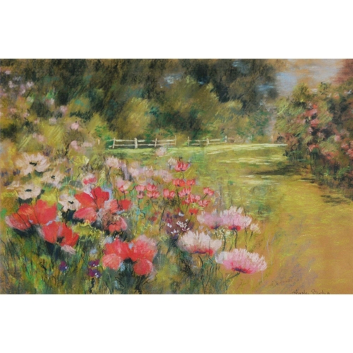 348 - HEATHER STIRLING (Twentieth/Twenty First Century)PASTEL DRAWING Landscape with flower-filled foregro... 