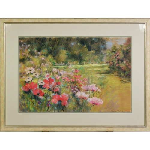 348 - HEATHER STIRLING (Twentieth/Twenty First Century)PASTEL DRAWING Landscape with flower-filled foregro... 