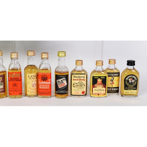 94 - THIRTY NINE MAINLY VINTAGE MINIATURE BOTTLES OF BLENDED SCOTCH WHISKY, with levels of on or over the... 