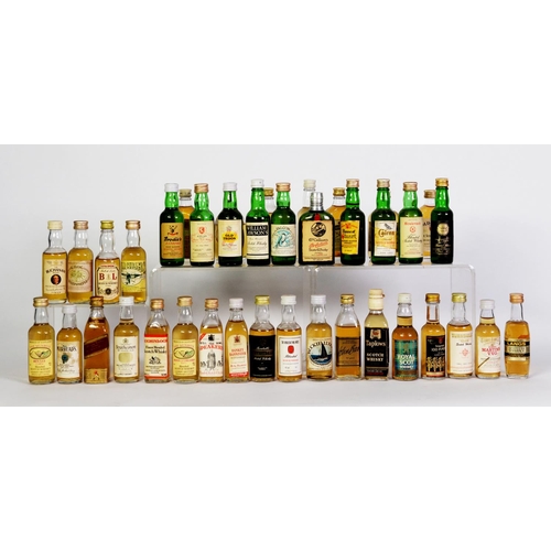 95 - THIRTY NINE MAINLY VINTAGE MINIATURE BOTTLES OF BLENDED SCOTCH WHISKY, with levels on or over the bo... 