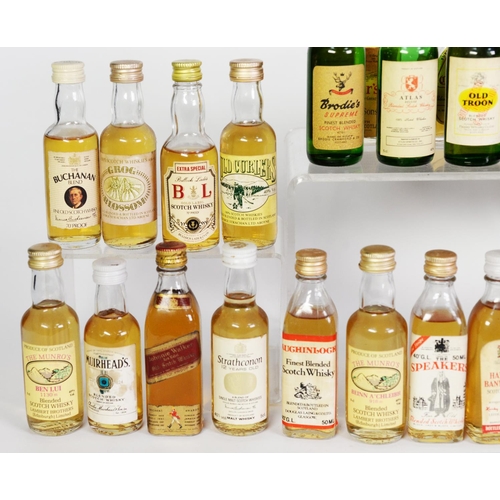 95 - THIRTY NINE MAINLY VINTAGE MINIATURE BOTTLES OF BLENDED SCOTCH WHISKY, with levels on or over the bo... 