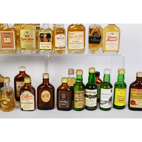 96 - THIRTY NINE MAINLY VINTAGE MINIATURE BOTTLES OF BLENDED SCOTCH WHISKY, with levels on or over the bo... 