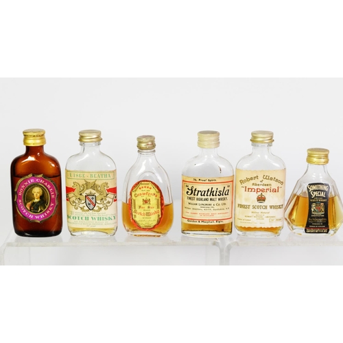 107 - TWENTY THREE VINTAGE VARIOUSLY SHAPED MINIATURE BOTTLES OF MALT, BLENDED AND OTHER WHISKY BASED SPIR... 