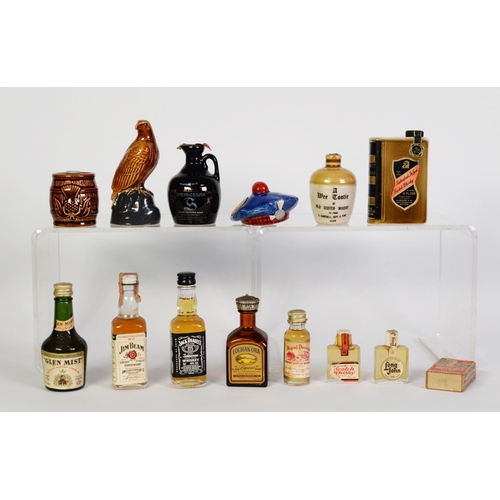 108 - SMALLEST BOTTLE OF WHISKY IN THE WORLD, in a Choice Blend matchbox; TWO SIMILAR SIZE BOTTLES OF WHIS... 