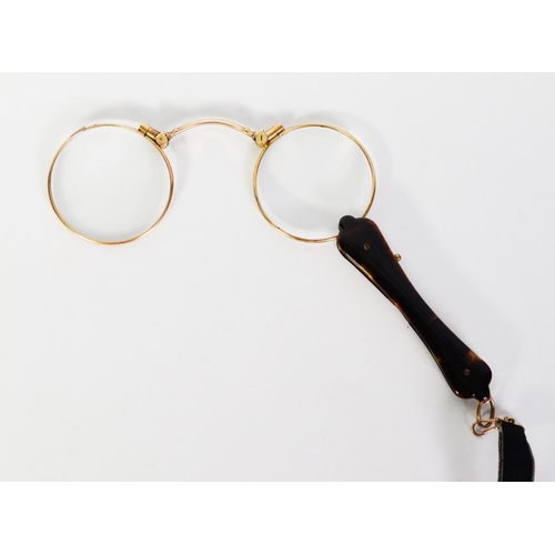 276 - EARLY TWENTIETH CENTURY GOLD PLATED FOLDING LORGNETTE with tortoiseshell handle with lens release bu... 