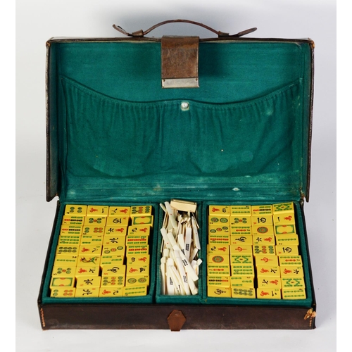 279 - PROBABLY HONG KONG MADE/RETAILED LEATHER CASED 'MAH-JONG' GAME