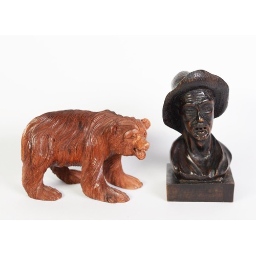 230 - CARVED HARDWOOD BUST OF A PEASANT with open mouth showing two teeth and wearing a wide brim hat, squ... 