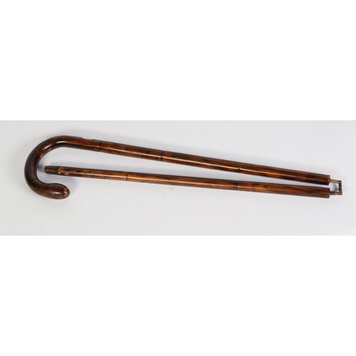 312 - VINTAGE TWO-PART FOLDING WALKING CANE, having brass folding and sliding linkage and folding in half,... 