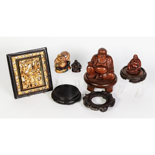 243 - SMALL GROUP OF CHINA RELATED CARVINGS, including vase stands, carved wood Buddhas, a soapstone polyc... 