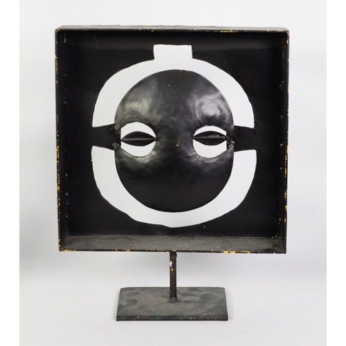 244 - MODERN METAL AFRICAN FOLK ART MASK SCULPTURE, finished in three different colours, a late 20th centu... 