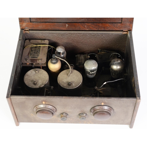 297 - VINTAGE OAK CASED VALVE RADIO RECEIVER, with two turning dials and external connectors for aerials a... 