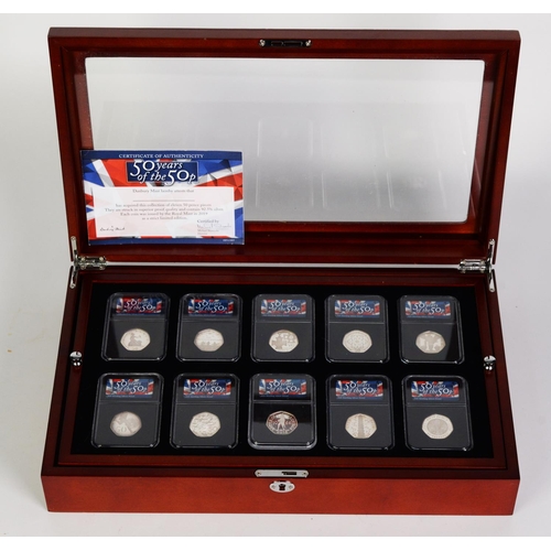 187 - THE DANBURY MINT CASED COLLECTION - 50 YEARS OF THE 50p, containing eleven 50p coins