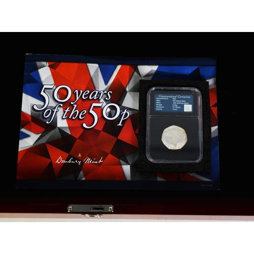 187 - THE DANBURY MINT CASED COLLECTION - 50 YEARS OF THE 50p, containing eleven 50p coins