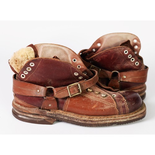 303 - PAIR DAOUST VINTAGE LEATHER SKI BOOTS with laceholes to the front and heel and leather straps, heavy... 