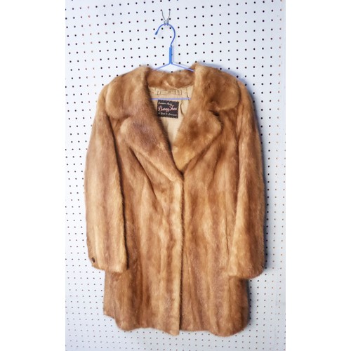 323 - LADY'S LIGHT BROWN 3/4 LENGTH FUR COAT, with revered collar, hook fastening, single breasted front w... 