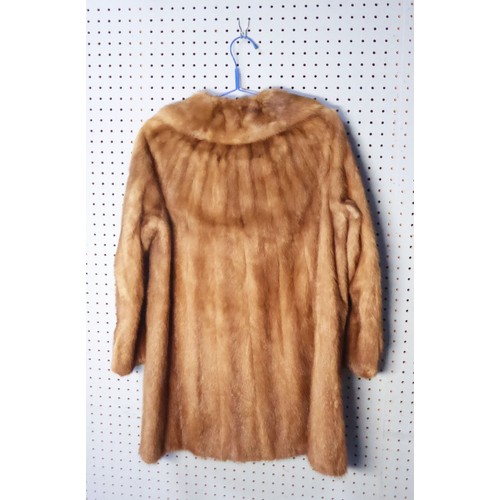 323 - LADY'S LIGHT BROWN 3/4 LENGTH FUR COAT, with revered collar, hook fastening, single breasted front w... 