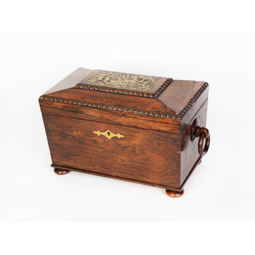 114 - REGENCY ROSEWOOD AND BRASS INLAID LARGE TEA CADDY, of sarcophagus form with ring handles to the side... 