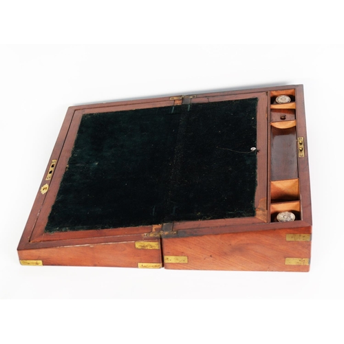 126 - VICTORIAN FLAME CUT MAHOGANY AND BRASS MOUNTED PORTABLE WRITING SLOPE, of typical form, the fitted i... 