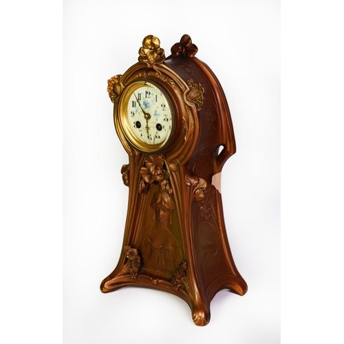 33 - EARLY TWENTIETH CENTURY ART NOUVEAU GILT SPELTER MANTLE CLOCK, the 3 ¼” enamelled Arabic dial with f... 