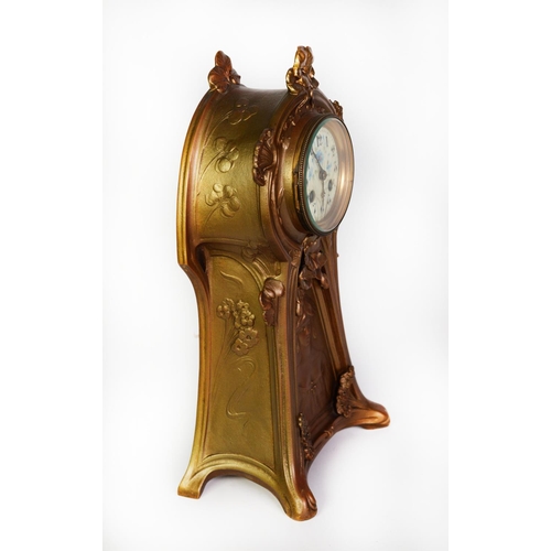 33 - EARLY TWENTIETH CENTURY ART NOUVEAU GILT SPELTER MANTLE CLOCK, the 3 ¼” enamelled Arabic dial with f... 