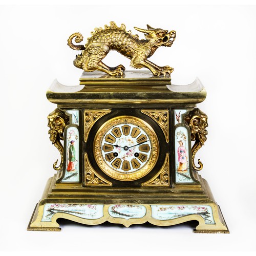 65 - NINETEENTH CENTURY GILT BRONZE AND HAND PAINTED PORCELAIN MANTLE CLOCK IN THE ORIENTAL TASTE, the 5”... 