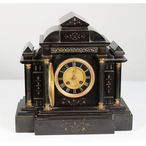 63 - VICTORIAN BLACK SLATE AND GILT METAL MOUNTED MANTLE CLOCK, the 4 ¼” Roman dial with matted gilt cent... 