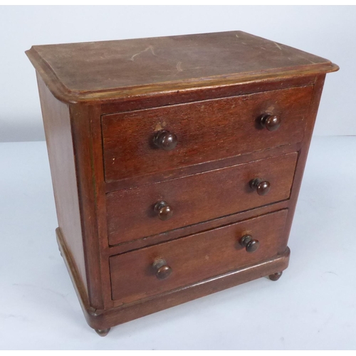 202 - APPRENTICE PIECE, VICTORIAN MAHOGANY CHEST OF THREE LONG DRAWERS, with rounded oblong top, turned kn... 