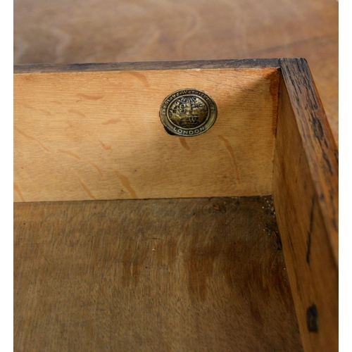 147 - GLOBE WERNICKE OAK LIBRARY TABLE, the oblong top above a pair of chamfered frieze drawers, an raised... 