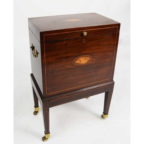 173 - GEORGE III INLAID MAHOGANY CELLARETTE, the oblong top with oval shell inlay, set above a matching fr... 