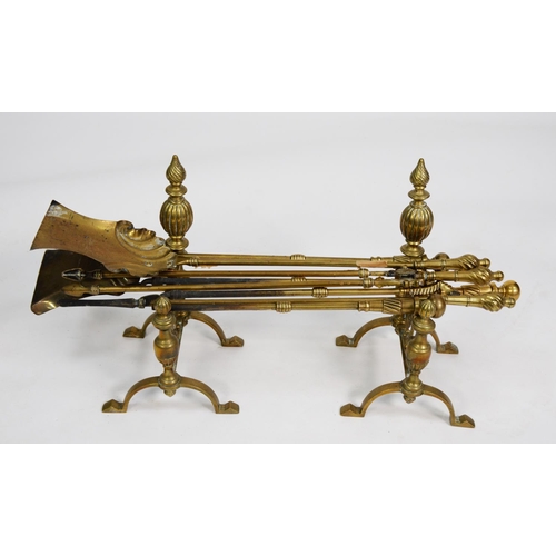 94 - NINETEENTH CENTURY THREE PIECE BRASS FIRESIDE COMPANION SET, together with ANOTHER SET OF THREE, the... 