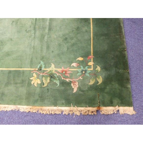 17 - PRE-WAR WASHED CHINESE LARGE, EMERALD GREEN CARPET with a single white line delineating the border, ... 