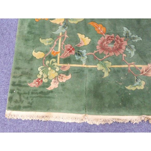 17 - PRE-WAR WASHED CHINESE LARGE, EMERALD GREEN CARPET with a single white line delineating the border, ... 